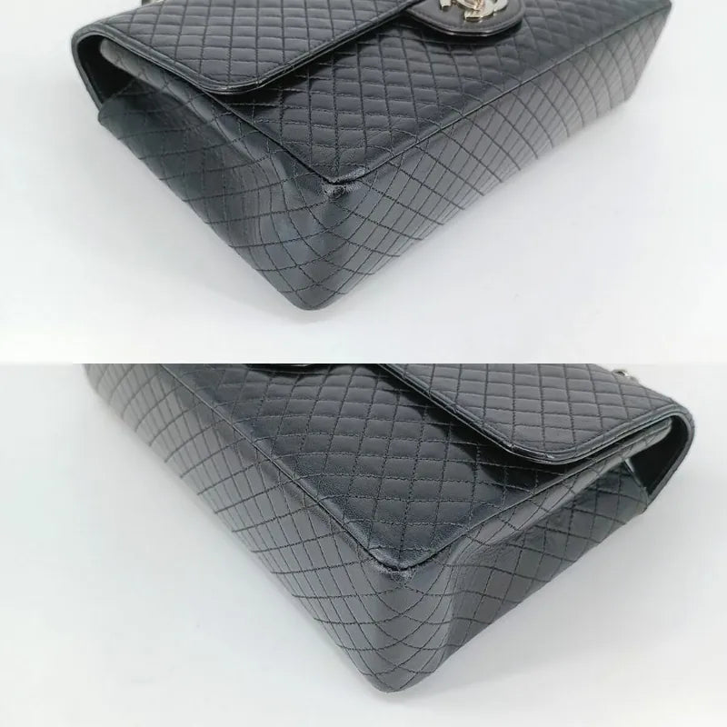 90201267-chanel-vintage-black-lambskin-quilted-flap-bag
