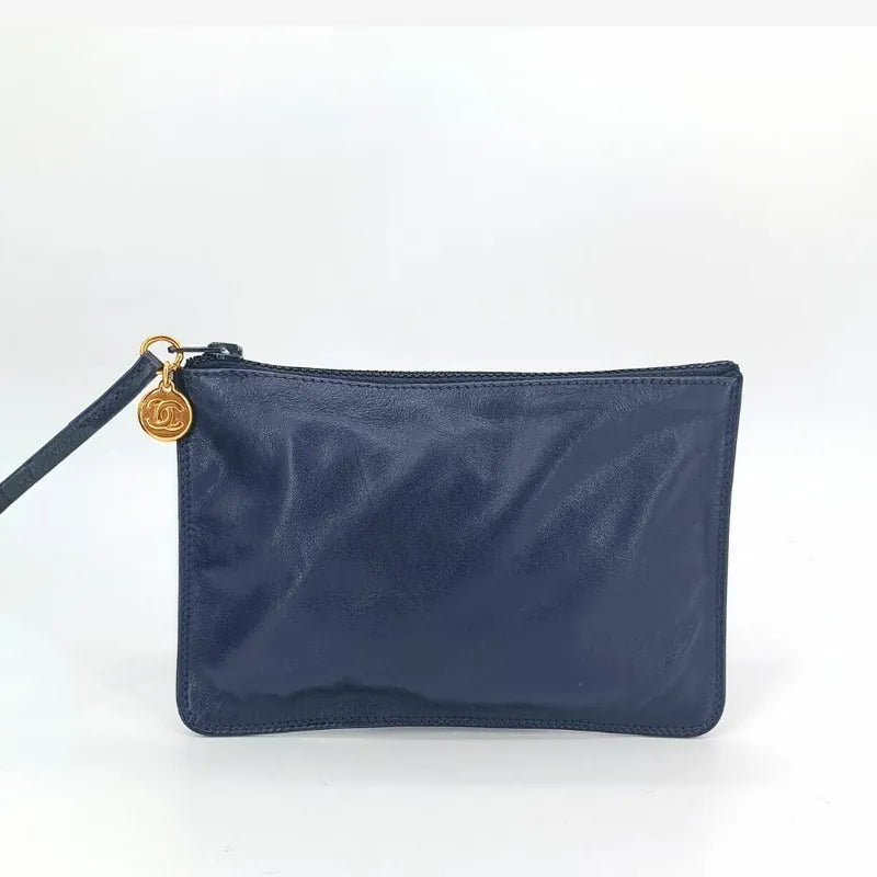 ra140-chanel-vintage-navy-lambskin-gold-ball-bucket-bag