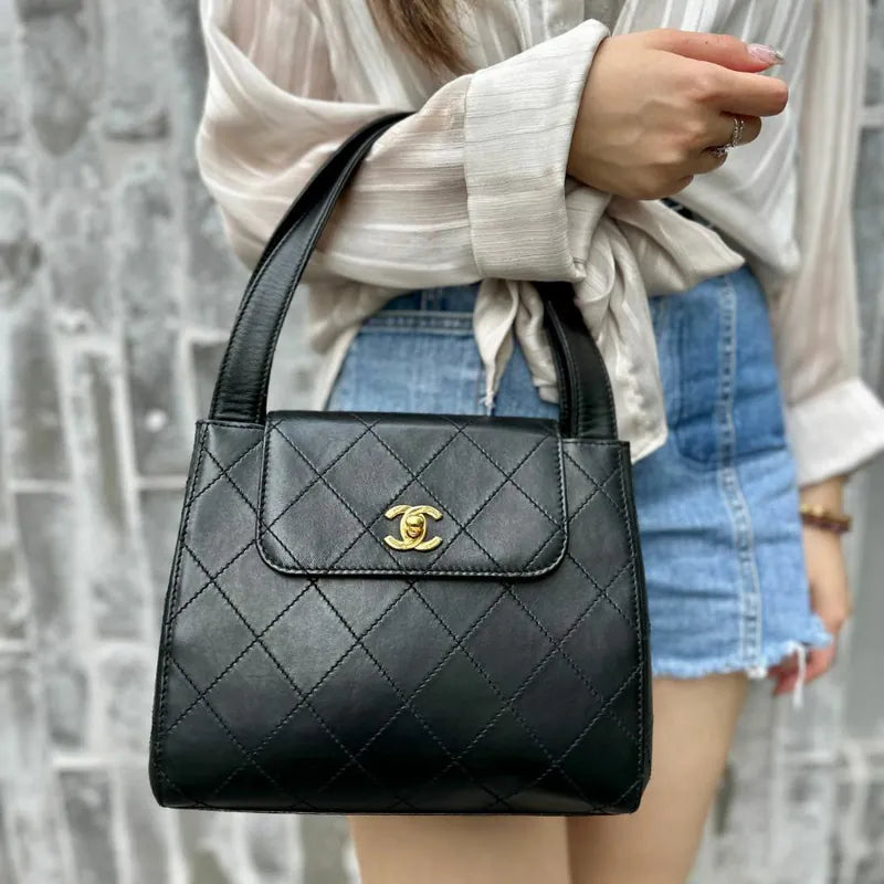 ra555-chanel-vintage-black-lambskin-quilted-handbag
