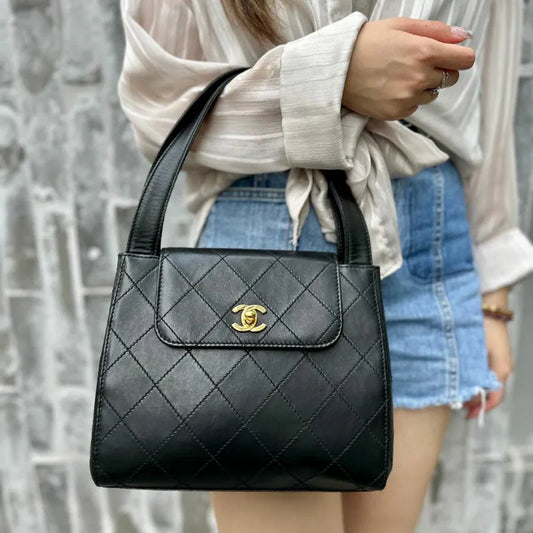 ra555-chanel-vintage-black-lambskin-quilted-handbag