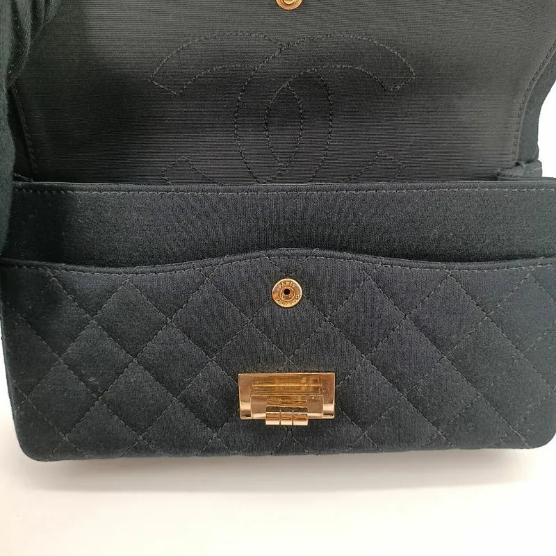 90196140-chanel-vintage-black-cotton-255-rhinestone-flap-bag