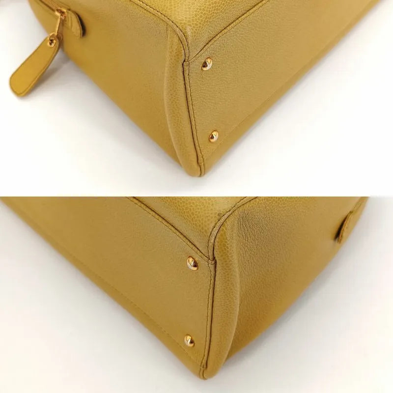 js337-chanel-vintage-yellow-caviar-leather-embossed-logo-tote-bag