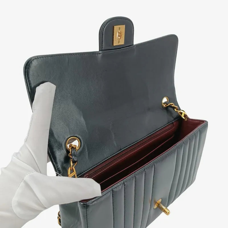 rb377-chanel-vintage-black-lambskin-vertical-flap-bag