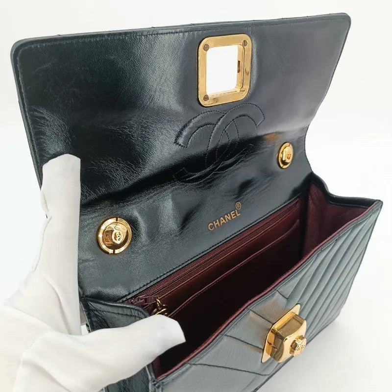 ju351-chanel-vintage-black-lambskin-chevron-push-lock-flap-bag