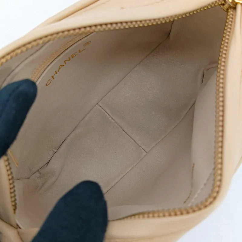 ra862-chanel-vintage-beige-lambskin-tassel-camera-bag