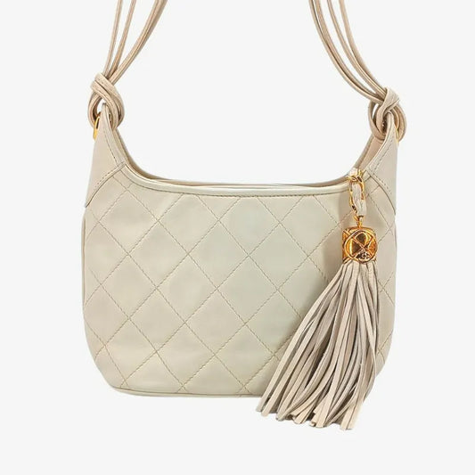 jr789-chanel-vintage-beige-lambskin-quilted-camera-bag