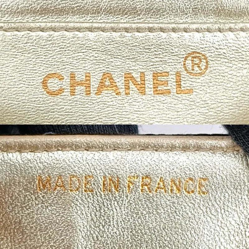 jt719-chanel-vintage-black-satin-chevron-gold-chain-flap-bag