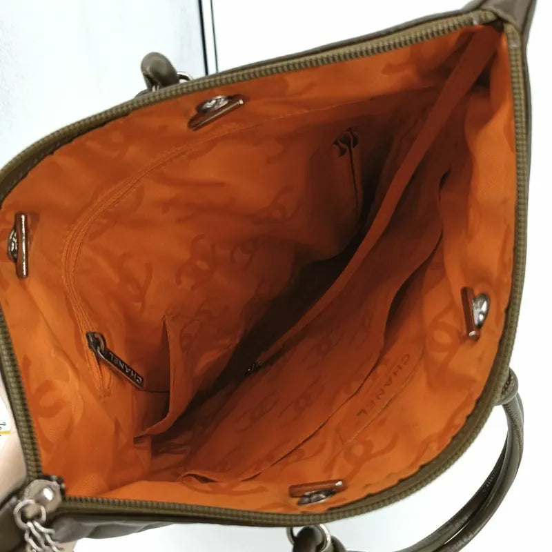 js509-chanel-vintage-olive-green-calfskin-snake-cc-logo-cambon-handbag