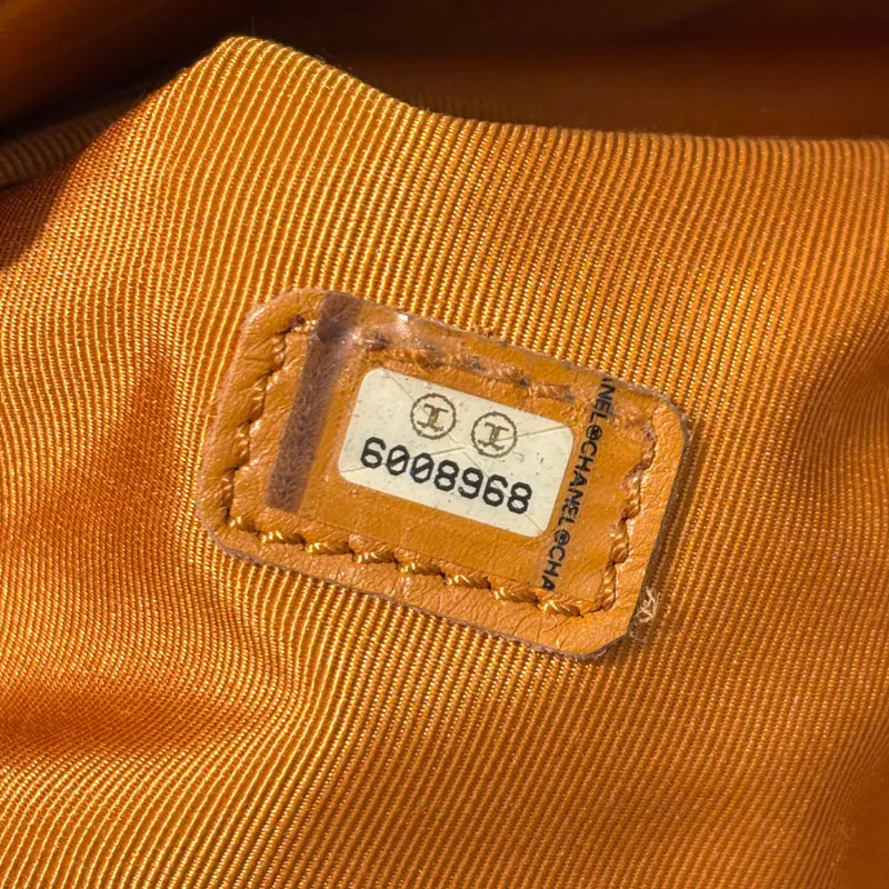 jw563-chanel-vintage-mustard-lambskin-cc-embossed-tote-bag