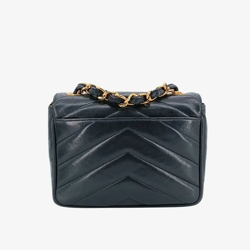 c407-chanel-vintage-navy-lambskin-chevron-mini-flap-bag