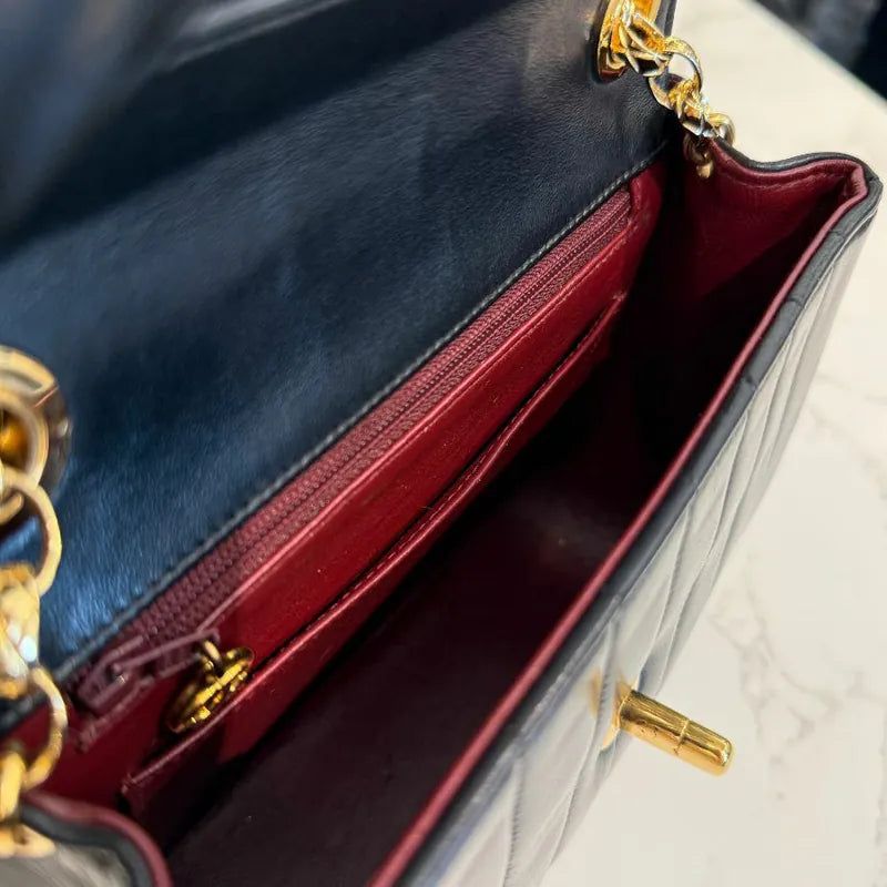 rc769-chanel-vintage-black-lambskin-vertical-gold-chain-flap-bag