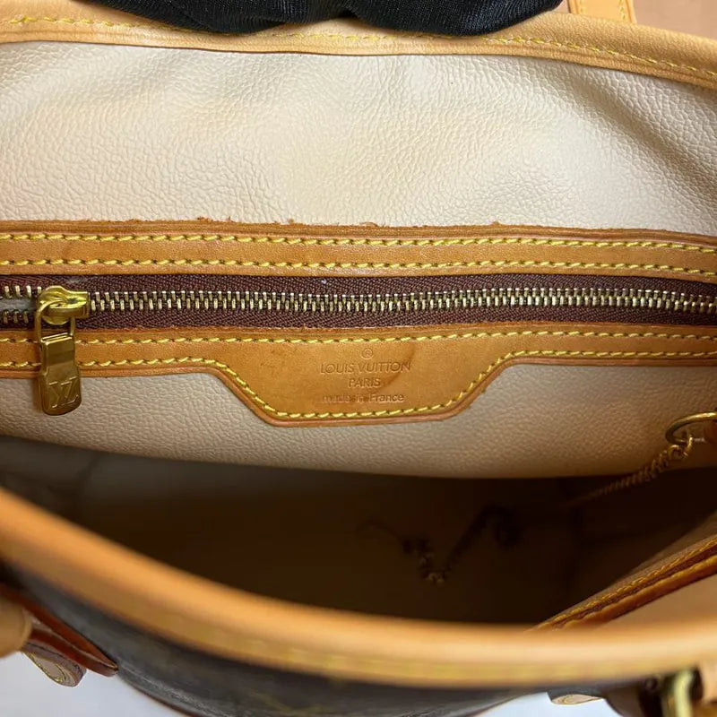 jw242-louis-vuitton-vintage-petite-monogram-bucket-bagrepaired-item