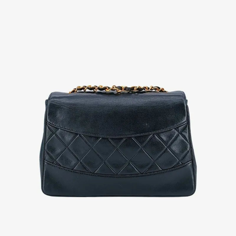 90227492-chanel-vintage-black-lambskin-trapezoid-flap-bag