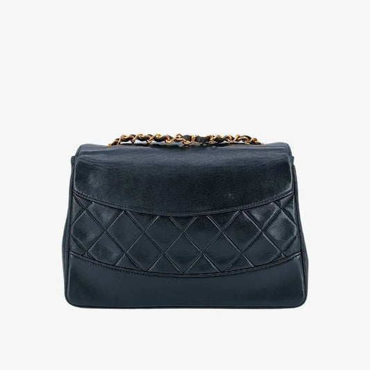 90227492-chanel-vintage-black-lambskin-trapezoid-flap-bag