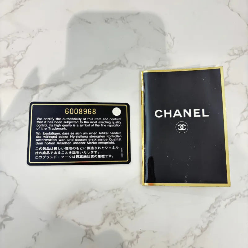 jw563-chanel-vintage-mustard-lambskin-cc-embossed-tote-bag