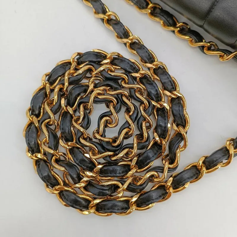 ra337-chanel-vintage-black-lambskin-vertical-jumbo-flap-bag