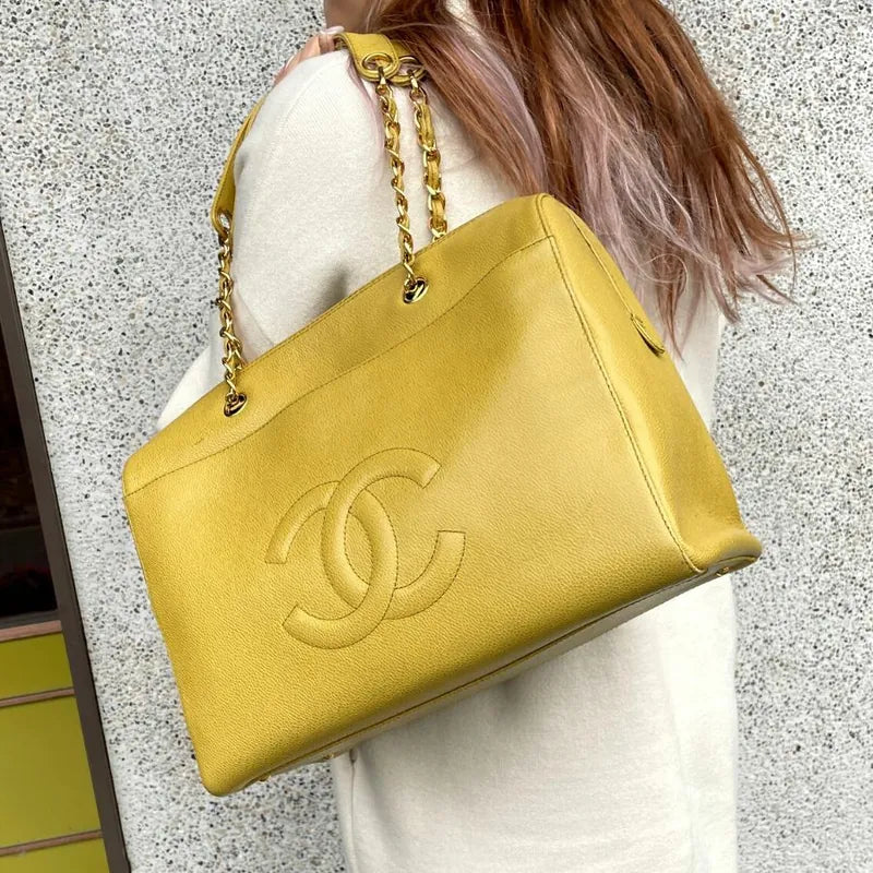js337-chanel-vintage-yellow-caviar-leather-embossed-logo-tote-bag
