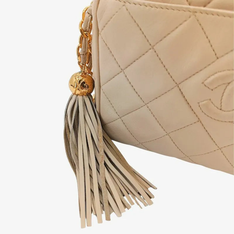 jah152-chanel-vintage-beige-lambskin-tassel-camera-bag