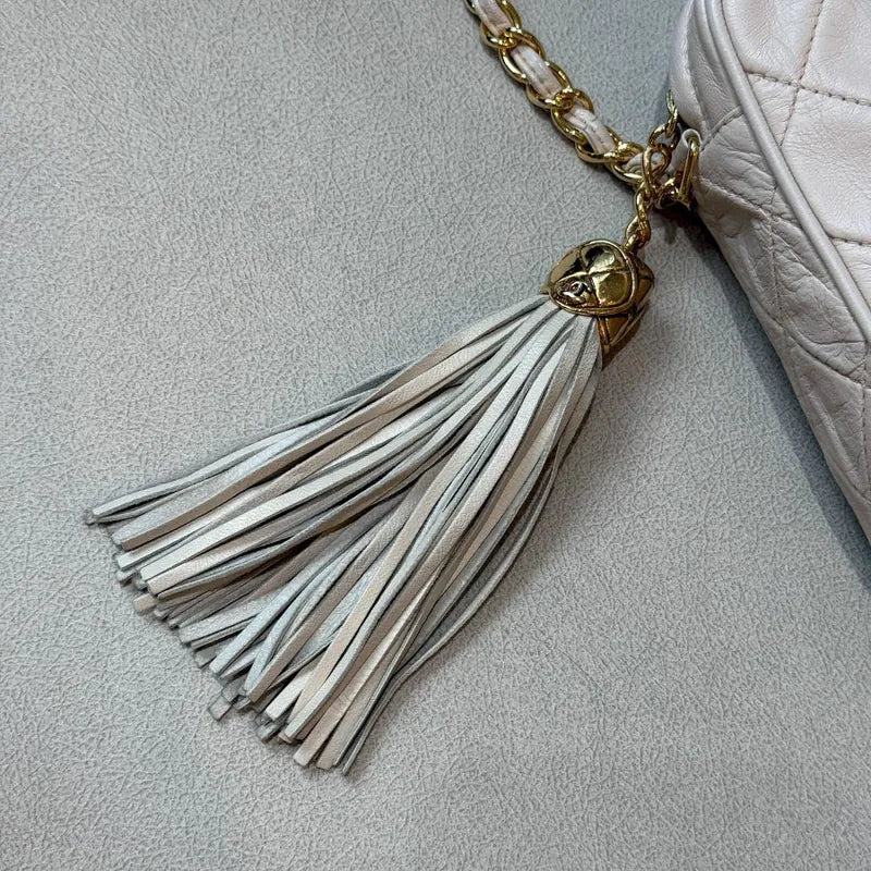 jx330-chanel-vintage-beige-lambskin-quilted-camera-bag