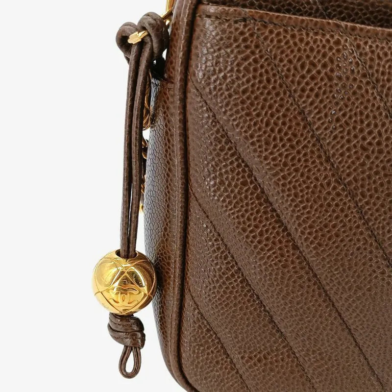 ra464-chanel-vintage-brown-caviar-leather-chevron-golden-ball-camera-bag