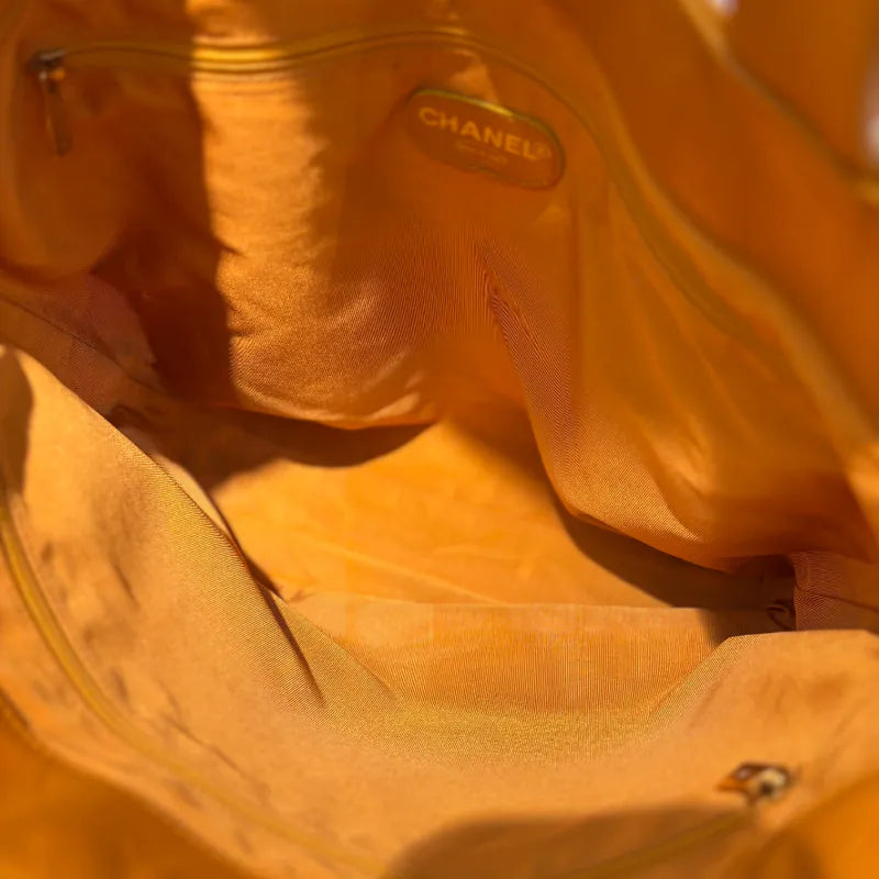 jw563-chanel-vintage-mustard-lambskin-cc-embossed-tote-bag