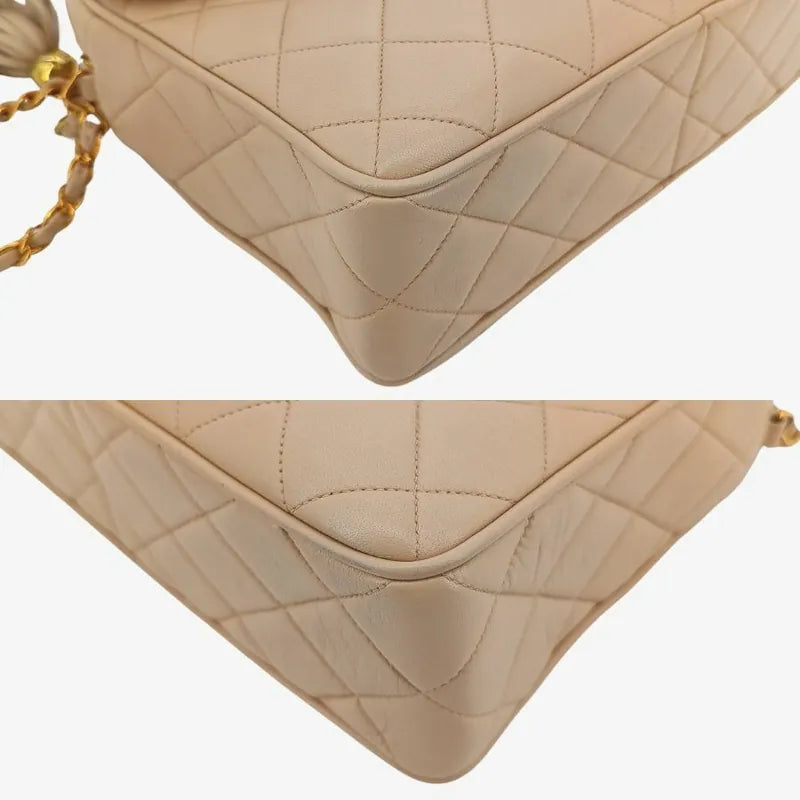 jah126-chanel-vintage-beige-lambskin-tassel-camera-bag