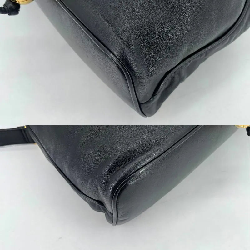 jw571-chanel-vintage-black-lambskin-drawstring-backpack