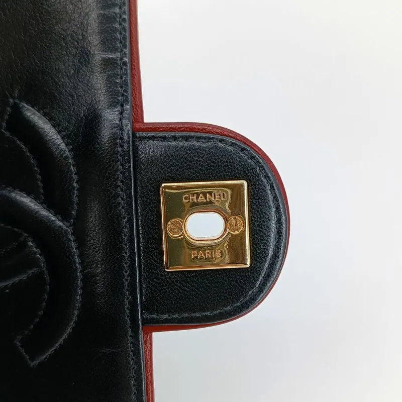 js491-chanel-vintage-black-lambskin-quilted-tassels-camera-bag