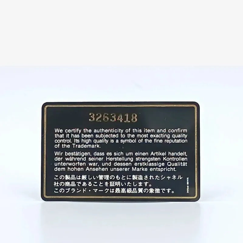 js491-chanel-vintage-black-lambskin-quilted-tassels-camera-bag