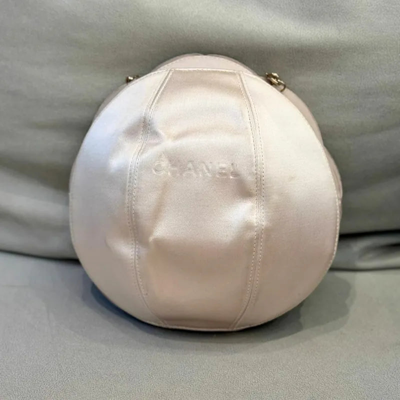 c531-chanel-vintage-pale-pink-calfskin-camellia-wristlet-evening-bag