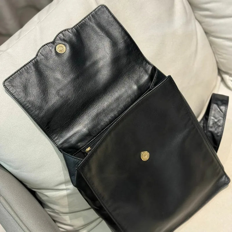 jx064-chanel-vintage-black-lambskin-backpack