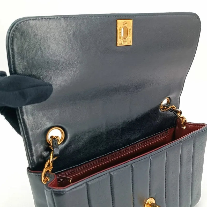 c365-chanel-vintage-black-lambskin-vertical-flap-bag