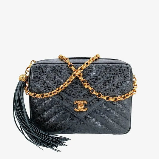 90211103-chanel-vintage-black-caviar-leather-gold-chain-chevron-camera-bag