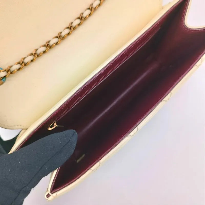 ra435-chanel-beige-sheepskin-quilted-beauty-lock-mini-flap-bag