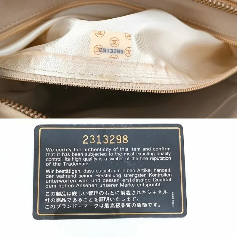 ra236-chanel-vintage-beige-lambskin-tessel-camera-bag