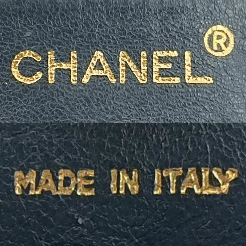 ju694-chanel-vintage-navy-lambskin-gold-chain-chevron-camera-bag