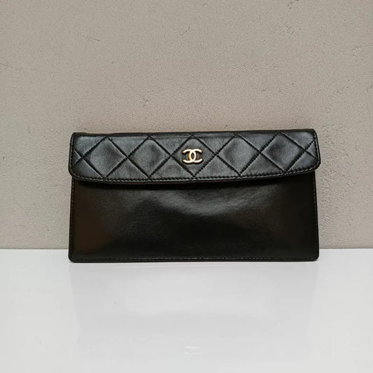 jx099-chanel-vintage-black-lambskin-pouch