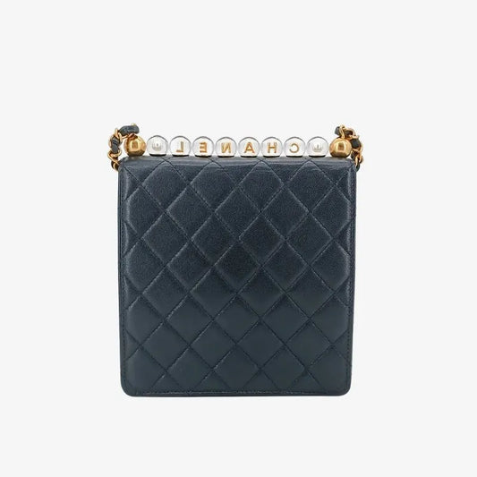 ra406-chanel-black-calfskin-quilted-acrylic-pearl-flap-bag
