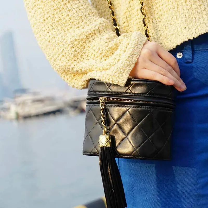 c302-chanel-vintage-black-lambskin-tassel-bucket-bag