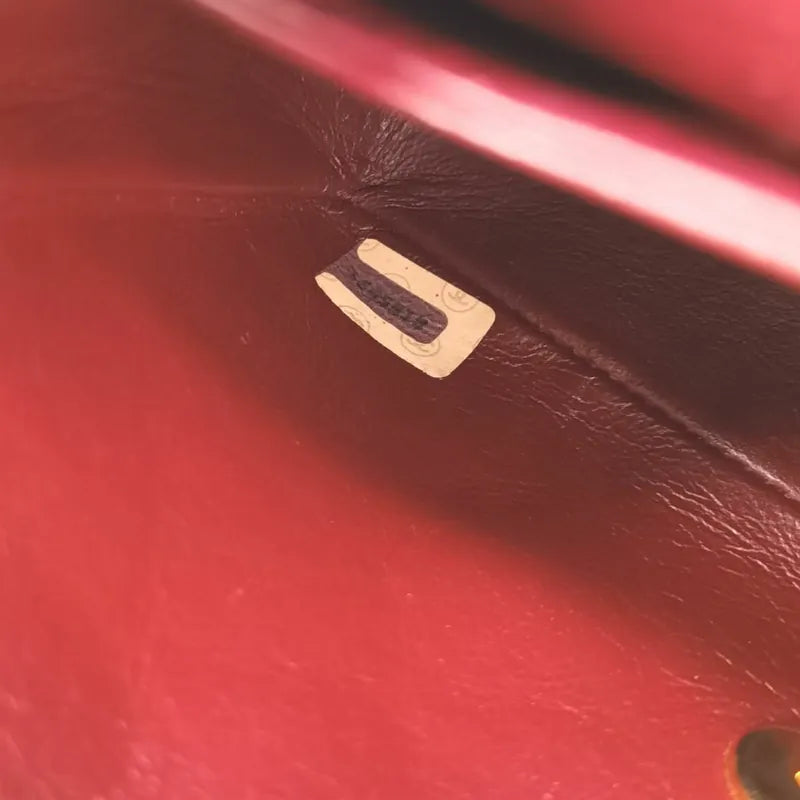 ra176-chanel-vintage-black-lambskin-gold-chain-flap-bag