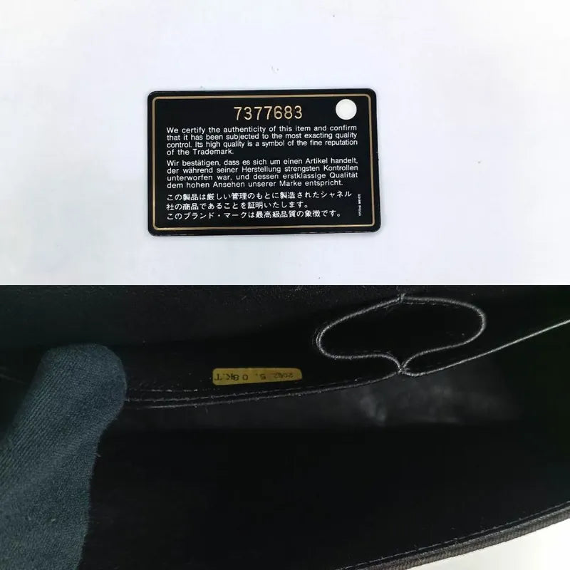 90173728-chanel-vintage-black-canvas-coco-print-flap-bag