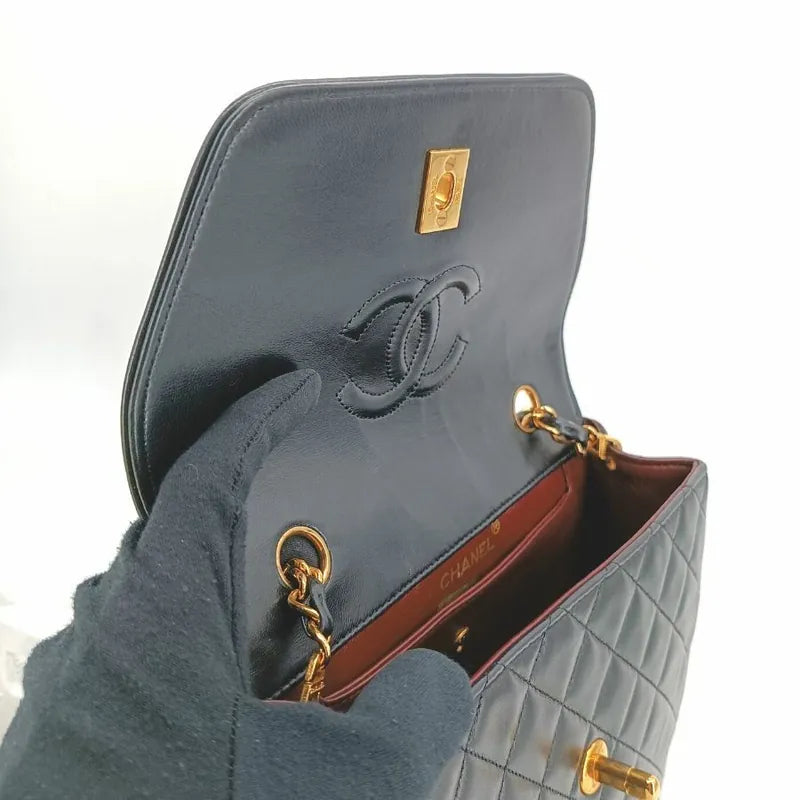 js402-chanel-vintage-black-lambskin-trapezoid-flap-bag