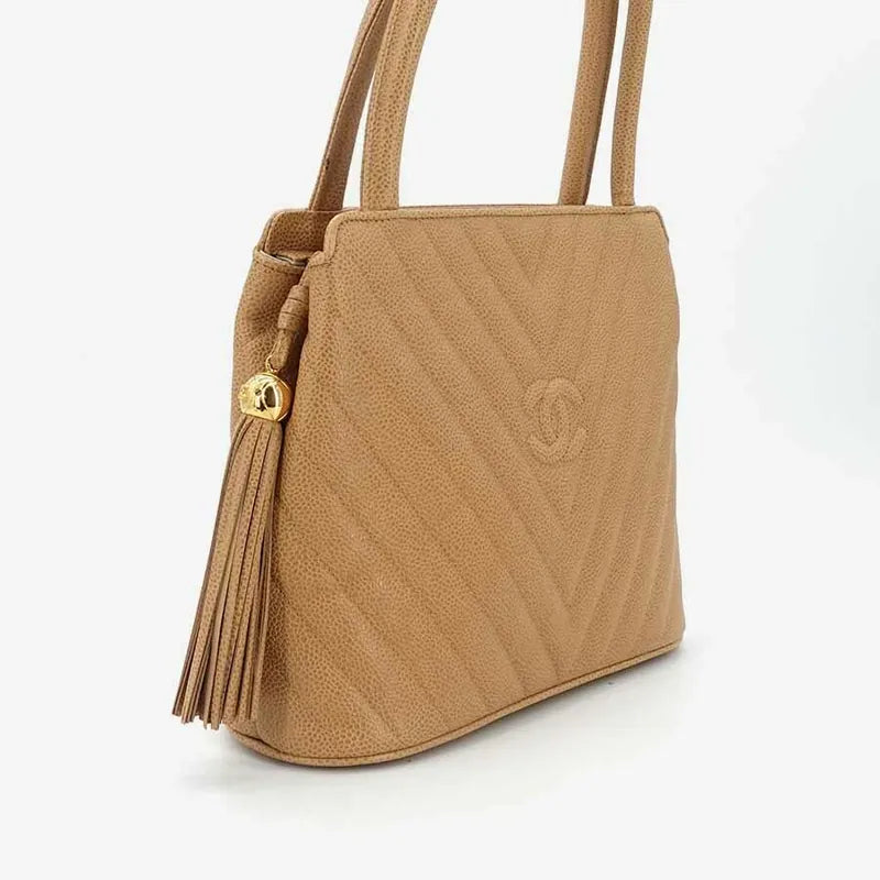jr876-chanel-vintage-beige-caviar-leather-handbag