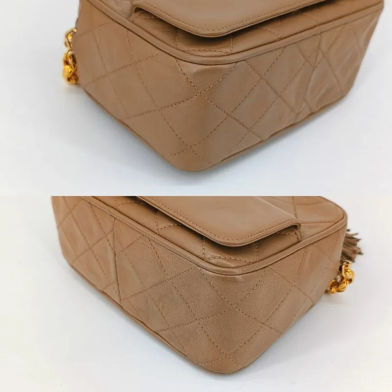 jt421-chanel-vintage-beige-lambskin-tassels-gold-chain-camera-bag