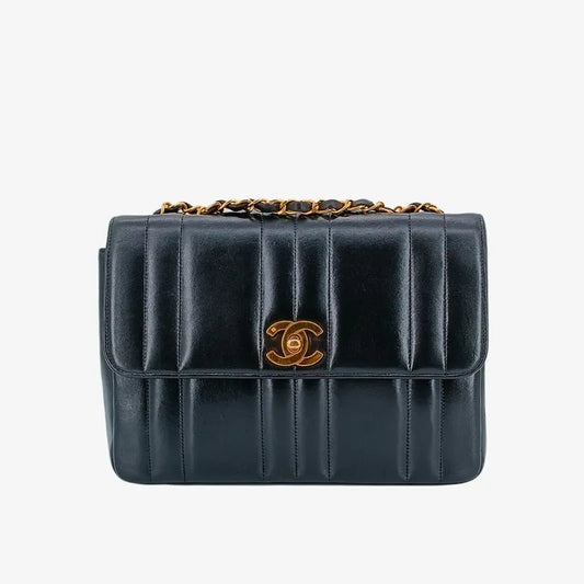 90223956-chanel-vintage-black-lambskin-vertical-flap-bag