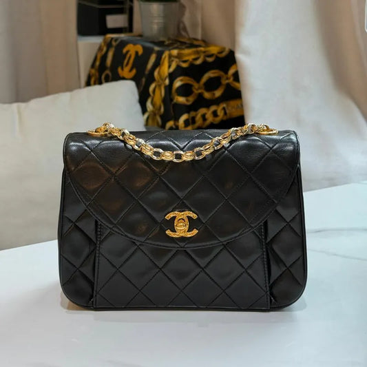 rc658-chanel-vintage-black-lambskin-gold-chain-flap-bag