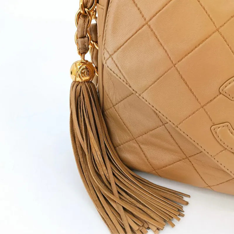 jah173-chanel-vintage-beige-lambskin-tassel-camera-bag