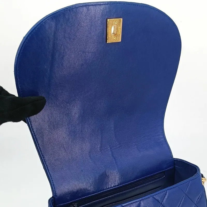 90201290-chanel-vintage-blue-lambskin-flap-bag