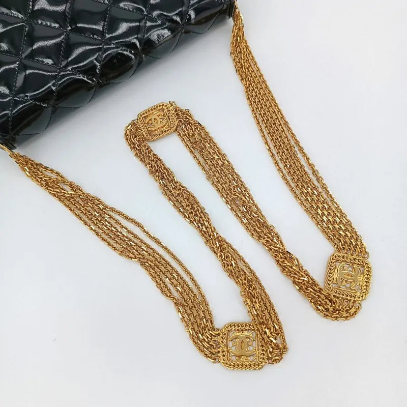 c320-chanel-vintage-black-patent-leather-quilted-flap-bag