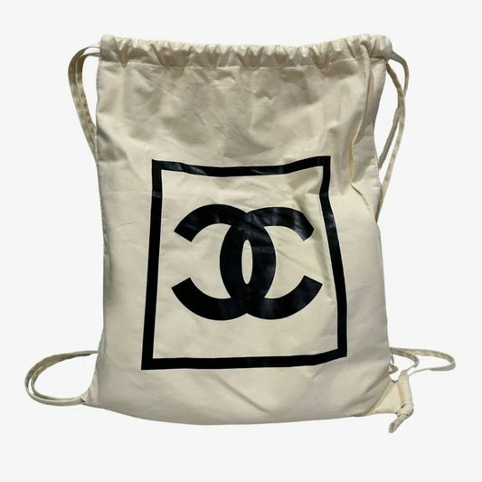 90241784-chanel-vintage-ivory-canvas-drawstring-backpack